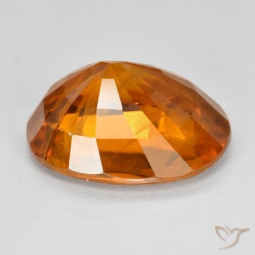 Zafiro Naranja oscuro natural de 5.58 ct, Ovalada, VS-SI