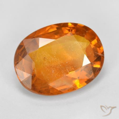 Zafiro Naranja rojizo natural de 6.96 ct, Ovalada, VS-SI