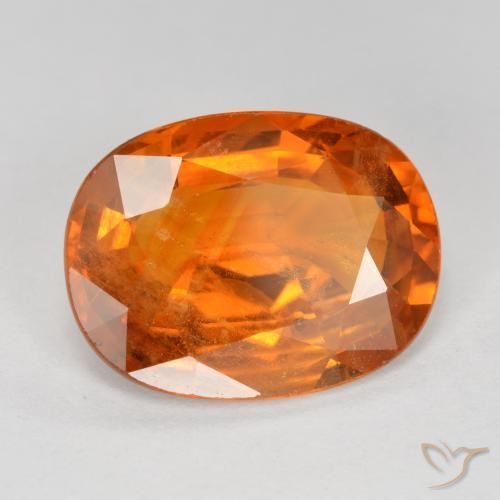 Zafiro Naranja medio natural de 6.78 ct, Ovalada, VS-SI