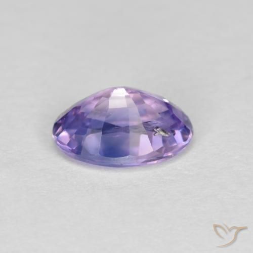 Zafiro Violeta claro medio natural de 0.57 ct, Ovalada, VS
