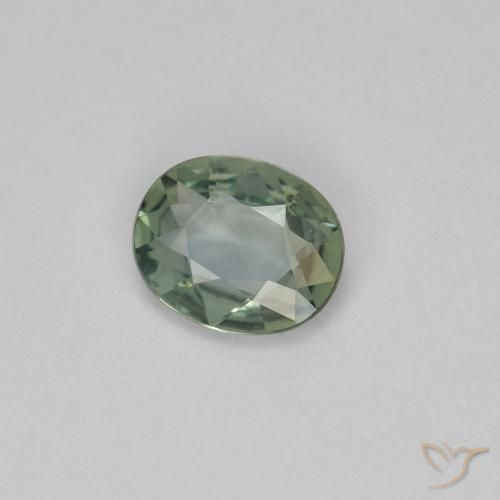 Zafiro Gris verdoso natural de 0.59 ct, Ovalada, VVS-VS