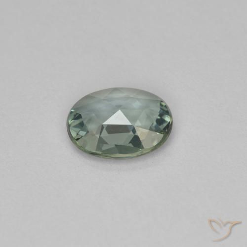 Zafiro Gris verdoso natural de 0.59 ct, Ovalada, VVS-VS