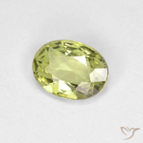 Zafiro Verde amarillento natural de 0.79 ct, Ovalada, VS