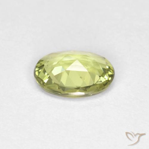 Zafiro Verde amarillento natural de 0.79 ct, Ovalada, VS