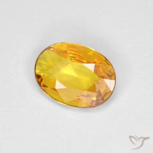 Zafiro Dorado natural de 0.69 ct, Ovalada, VS
