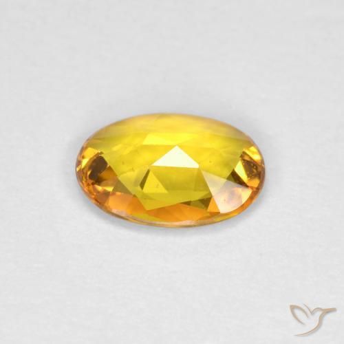Zafiro Dorado natural de 0.69 ct, Ovalada, VS