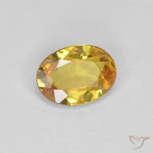 Zafiro Dorado natural de 0.71 ct, Ovalada, VS