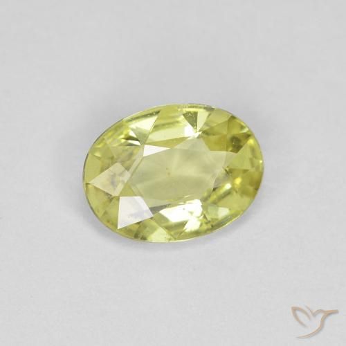 Zafiro Amarillo verdoso claro natural de 0.66 ct, Ovalada, VS