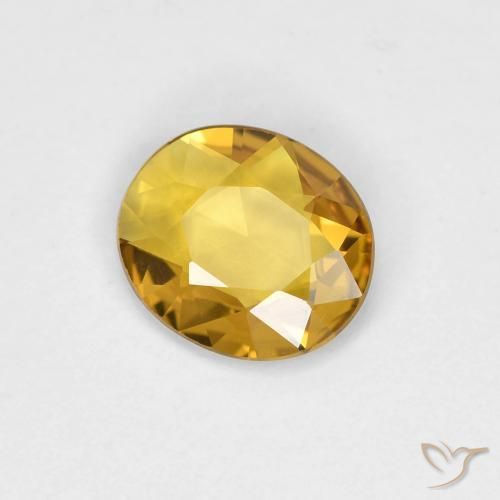 Zafiro Dorado natural de 0.53 ct, Ovalada, VVS