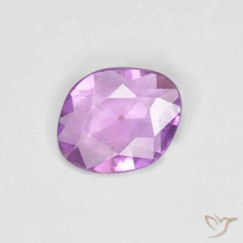 Zafiro Púrpura eléctrico natural de 0.62 ct, Elegante, VS