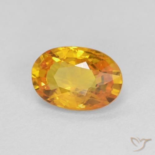 Zafiro Dorado-naranja medio natural de 0.70 ct, Ovalada, VS