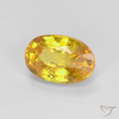 Zafiro Naranja dorado natural de 0.75 ct, Ovalada, VS