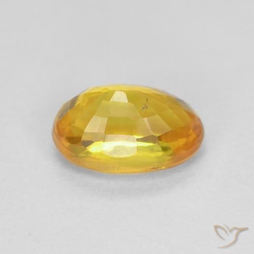 Zafiro Naranja dorado natural de 0.75 ct, Ovalada, VS