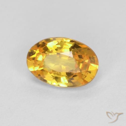 Zafiro Dorado medio natural de 0.60 ct, Ovalada, VVS