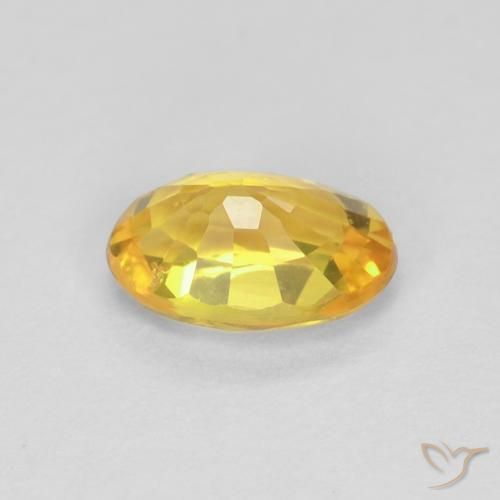 Zafiro Dorado medio natural de 0.60 ct, Ovalada, VVS