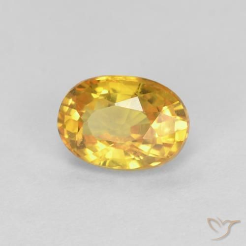 Zafiro Dorado natural de 0.71 ct, Ovalada, VVS
