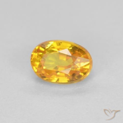 Zafiro Dorado natural de 0.73 ct, Ovalada, VVS