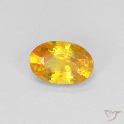 Zafiro Dorado natural de 0.59 ct, Ovalada, VVS