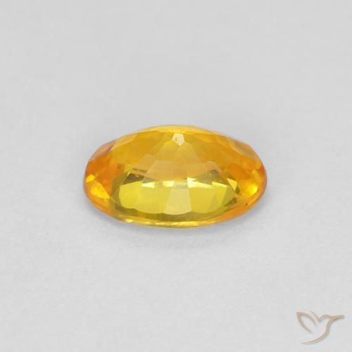 Zafiro Dorado natural de 0.59 ct, Ovalada, VVS