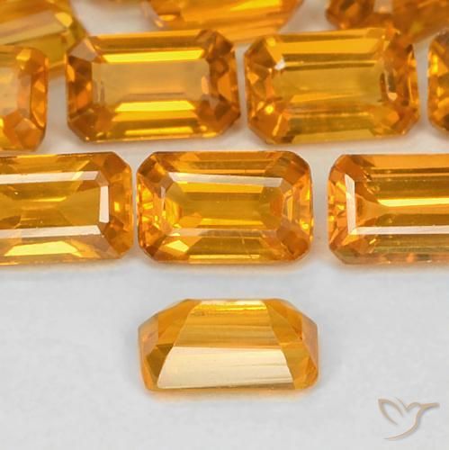 Zafiro Dorado naranja intenso natural de 0.43 ct, Corte Octágono / Esmeralda, VS