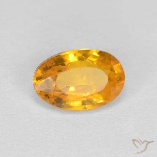 Zafiro Naranja medio natural de 0.60 ct, Ovalada, VVS