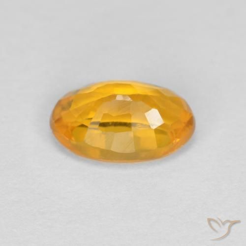 Zafiro Naranja medio natural de 0.60 ct, Ovalada, VVS