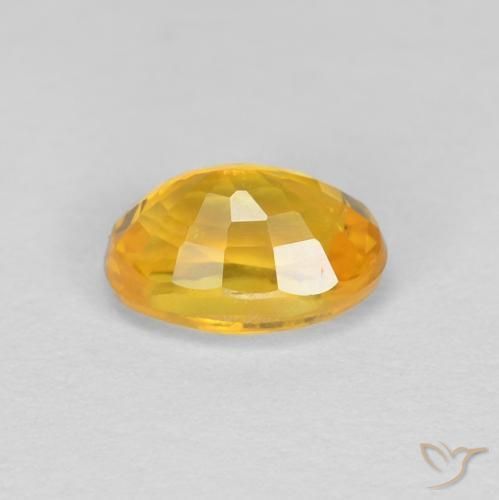 Zafiro Dorado oscuro natural de 0.70 ct, Ovalada, VVS