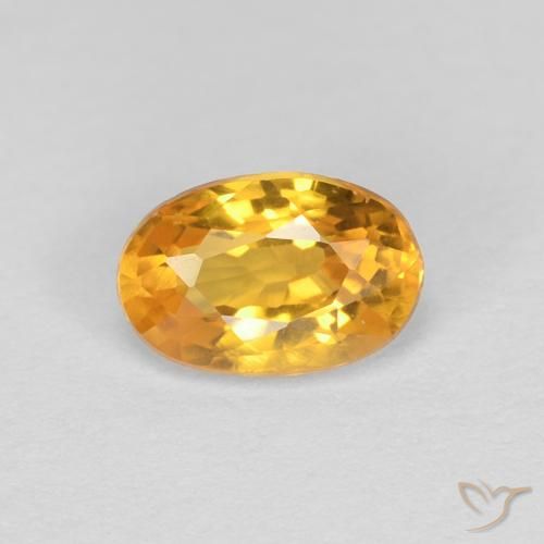 Zafiro Naranja dorado intenso natural de 0.55 ct, Ovalada, VVS
