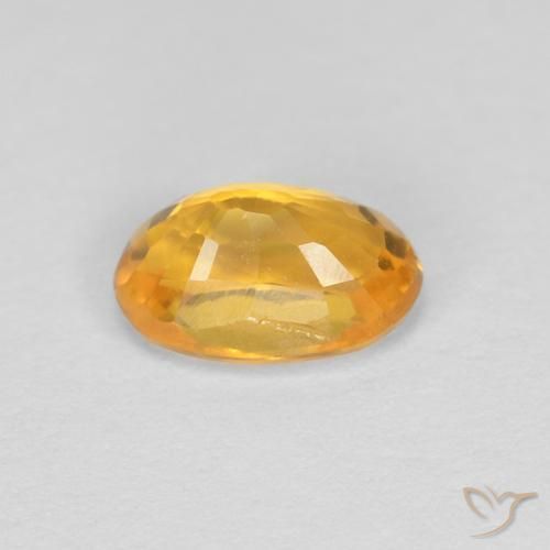 Zafiro Naranja dorado intenso natural de 0.55 ct, Ovalada, VVS
