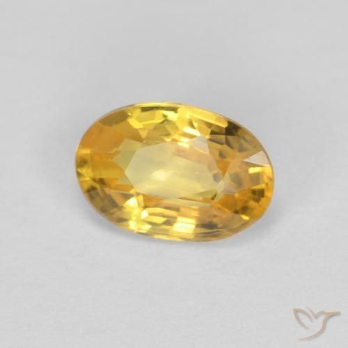 Zafiro Dorado natural de 0.59 ct, Ovalada, VVS