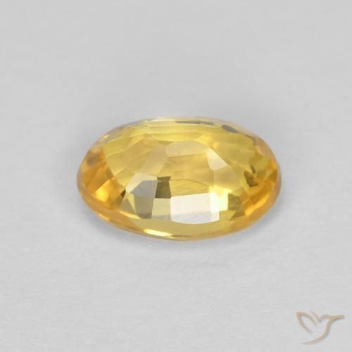 Zafiro Dorado natural de 0.59 ct, Ovalada, VVS
