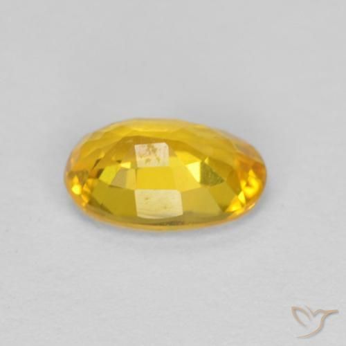 Zafiro Dorado natural de 0.60 ct, Ovalada, VS