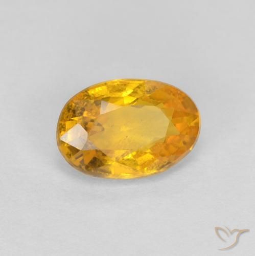Zafiro Dorado oscuro natural de 0.56 ct, Ovalada, VS-SI