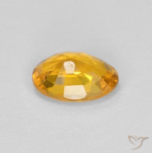 Zafiro Dorado oscuro natural de 0.56 ct, Ovalada, VS-SI