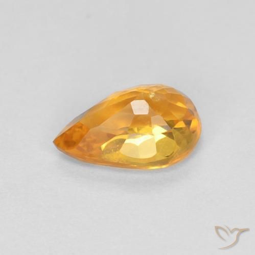 Zafiro Dorado naranja intenso natural de 0.54 ct, En forma de pera, VS-SI