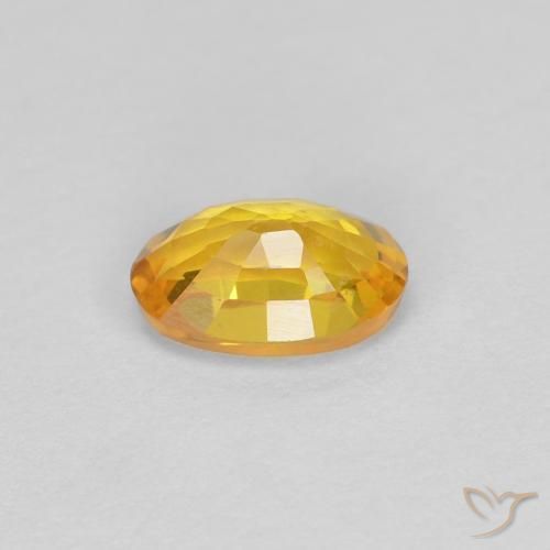 Zafiro Dorado natural de 0.57 ct, Ovalada, VVS