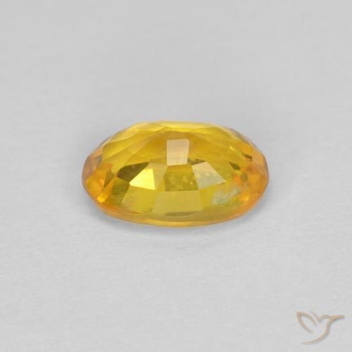 Zafiro Dorado natural de 0.68 ct, Ovalada, VVS