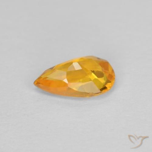 Zafiro Dorado naranja intenso natural de 0.47 ct, En forma de pera, VVS