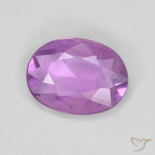 Zafiro Púrpura rosáceo medio natural de 0.65 ct, Ovalada, VVS-VS