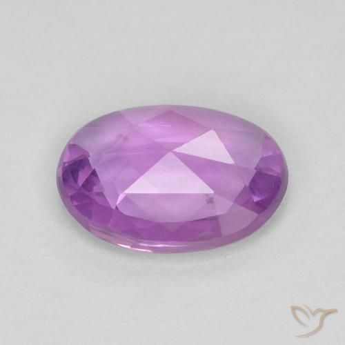 Zafiro Púrpura rosáceo medio natural de 0.65 ct, Ovalada, VVS-VS