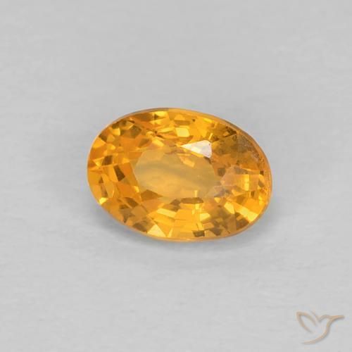 0.66ct Natural Dorado naranja Zafiro, Ovalada, VS