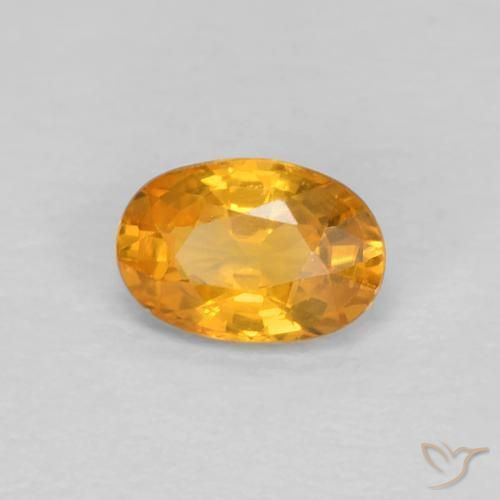 Zafiro Naranja medio natural de 0.56 ct, Ovalada, VVS-VS
