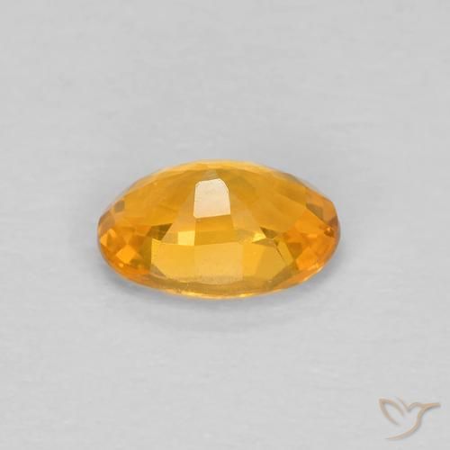 Zafiro Naranja medio natural de 0.56 ct, Ovalada, VVS-VS