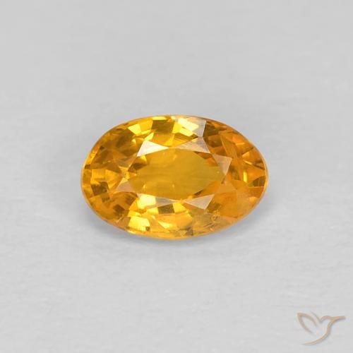 0.54ct Natural Dorado naranja Zafiro, Ovalada, VS