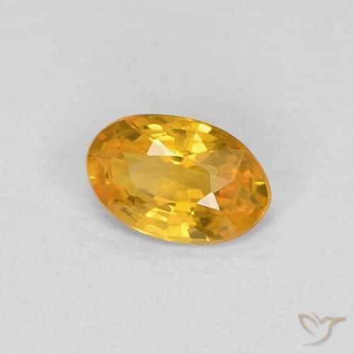 Zafiro Dorado naranja natural de 0.46 ct, Ovalada, VVS-VS