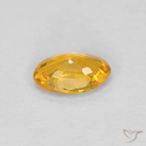 Zafiro Dorado naranja natural de 0.46 ct, Ovalada, VVS-VS