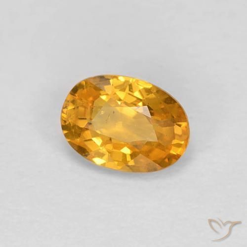 Zafiro Naranja medio natural de 0.60 ct, Ovalada, VS