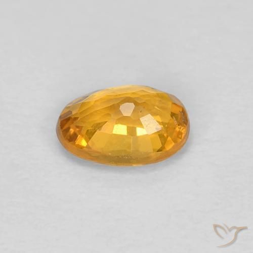 Zafiro Naranja medio natural de 0.60 ct, Ovalada, VS
