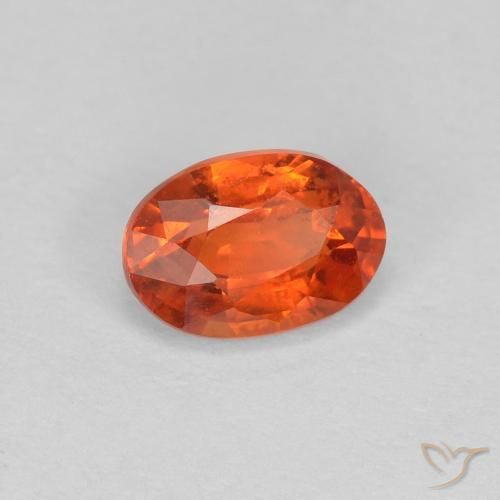 Zafiro Naranja rojizo natural de 0.68 ct, Ovalada, VS