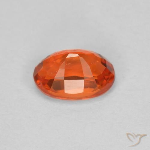 Zafiro Naranja rojizo natural de 0.68 ct, Ovalada, VS